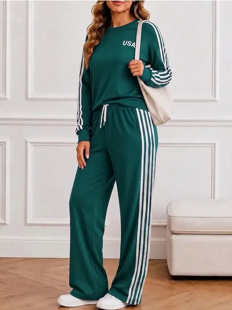 Un conjunto de pantalones de pierna ancha con cuello redondo, de unicolor y estampado, para un look de moda y casual · Verde